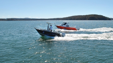 Image of Formosa Tomahawk Offshore 480 Centre Console with Half Cab in background